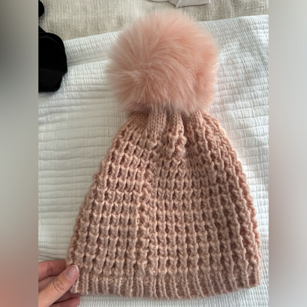 Pink knit beanie with Pom